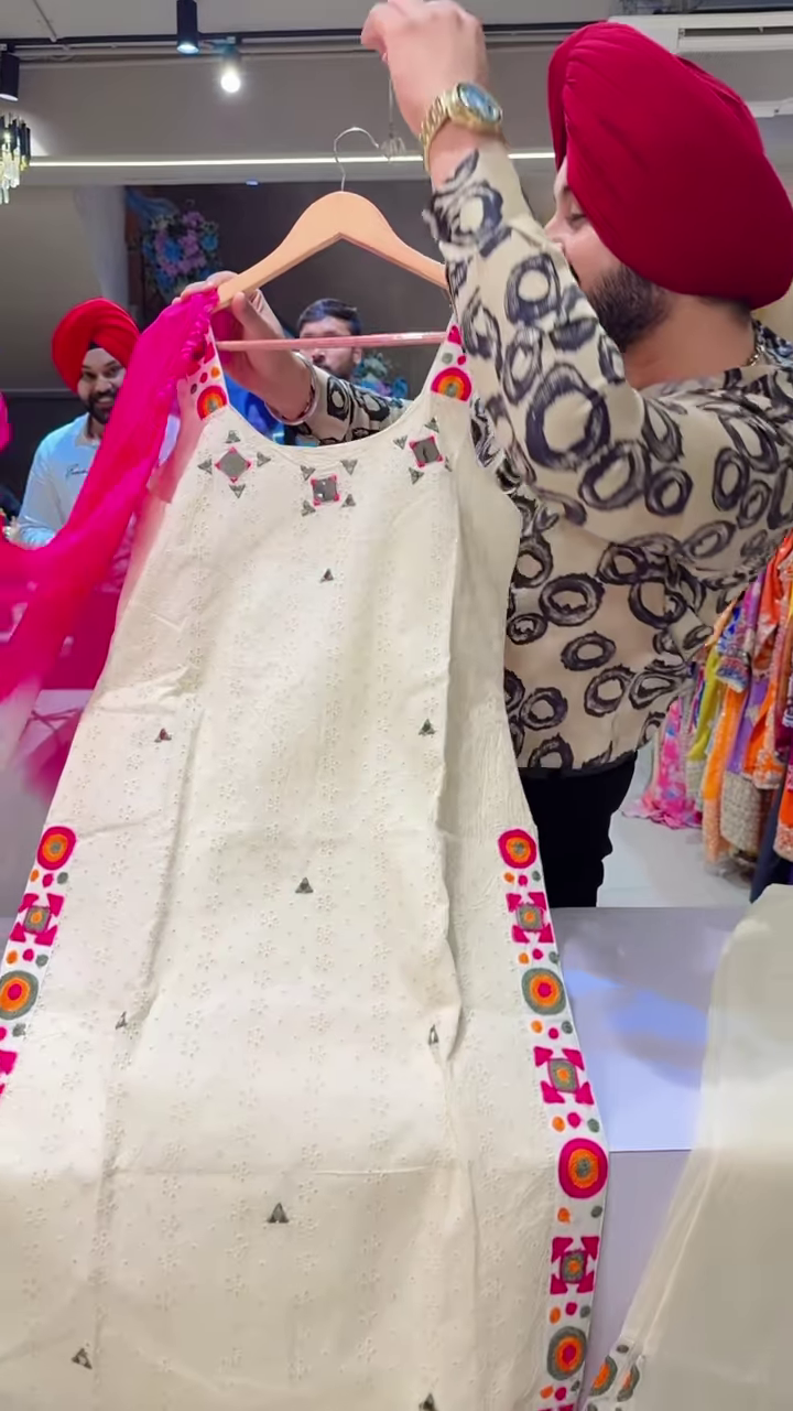 Cream Floral Embroidered Long Dress with Purple Lace Cuffs and Brown Bottoms - Image 5