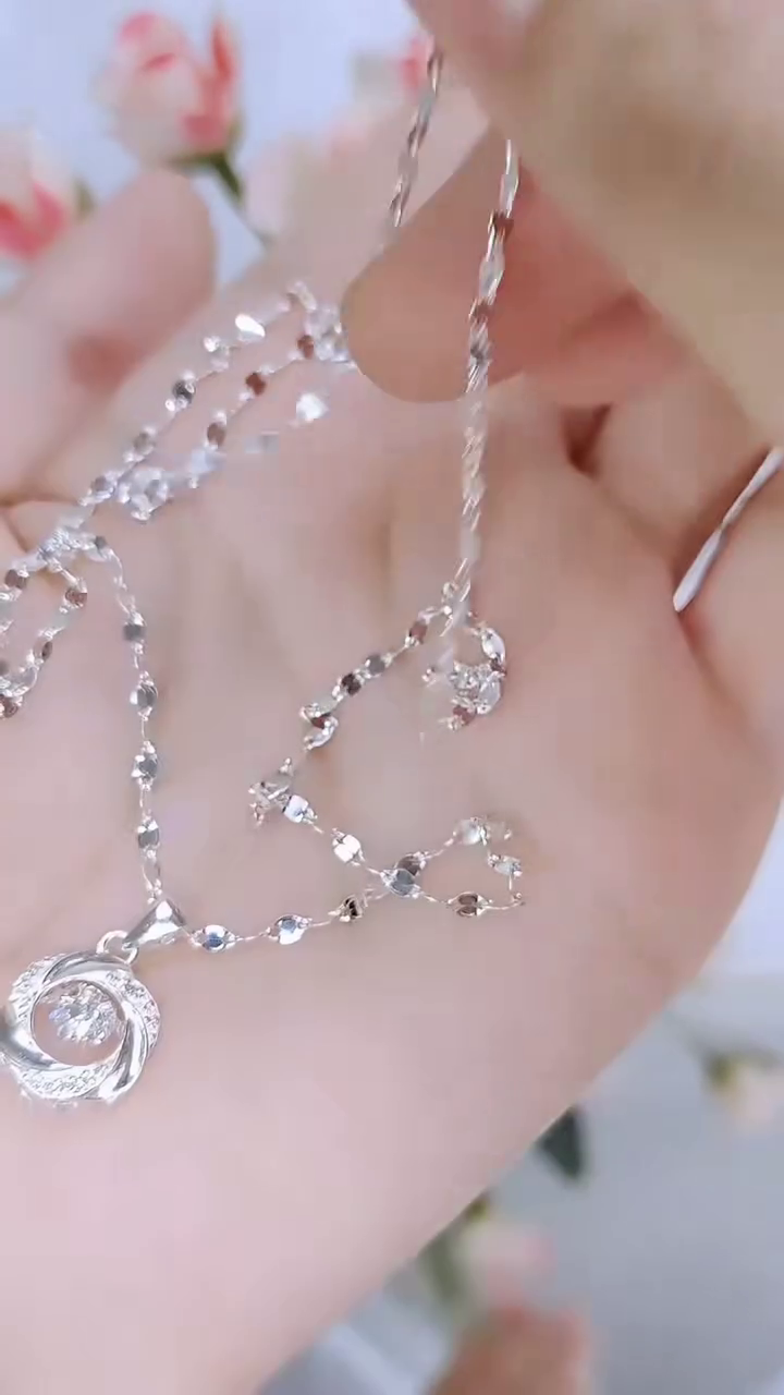 Elegant Silver Necklace with Twisted Floral Pendant – Sparkling Crystal Centerpiece - Image 2