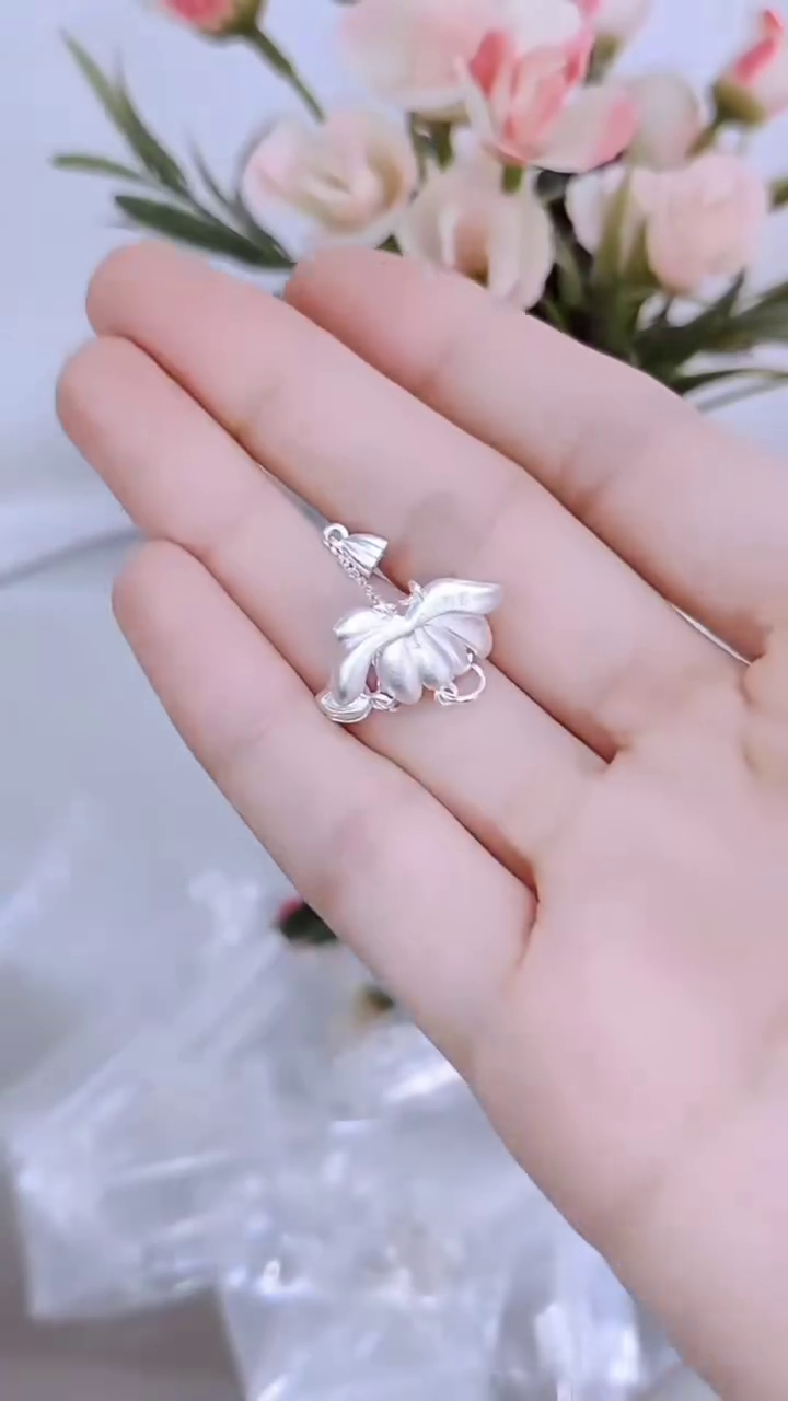 Silver Lotus Pendant Necklace with Tassel Details - Image 2