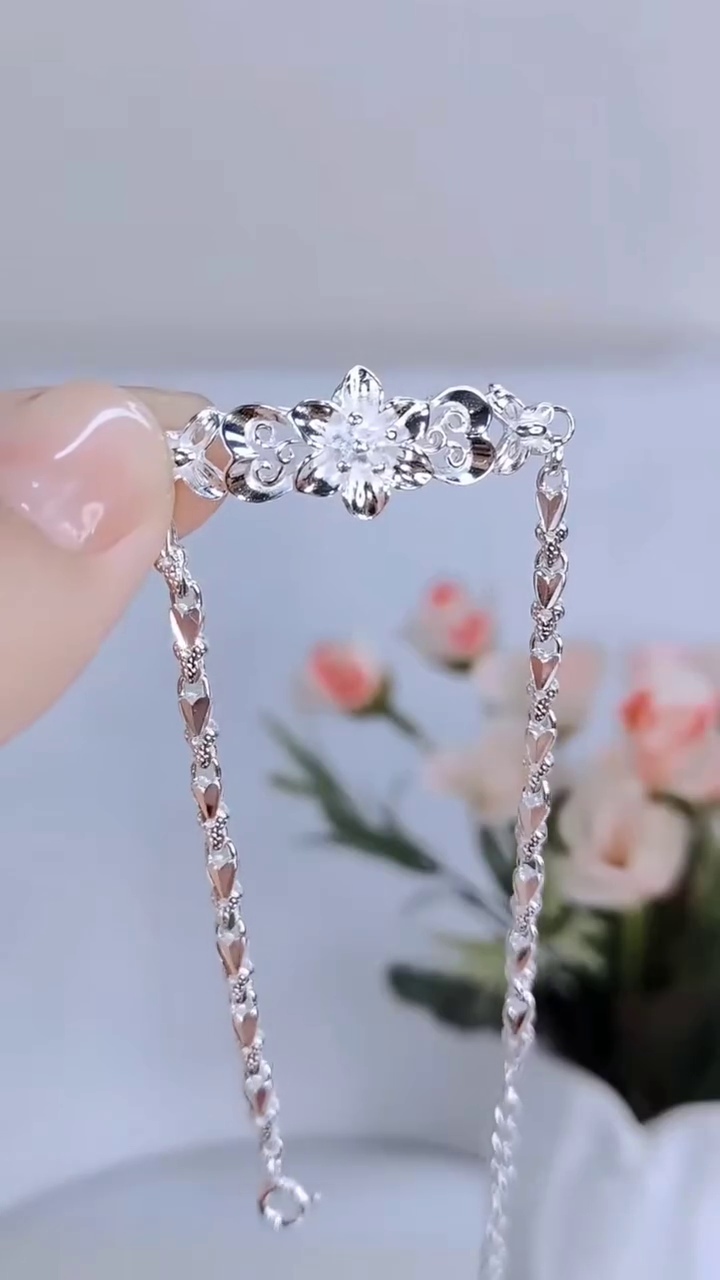 Elegant Sterling Silver Floral Link Bracelet with Intricate Openwork Design - Image 2