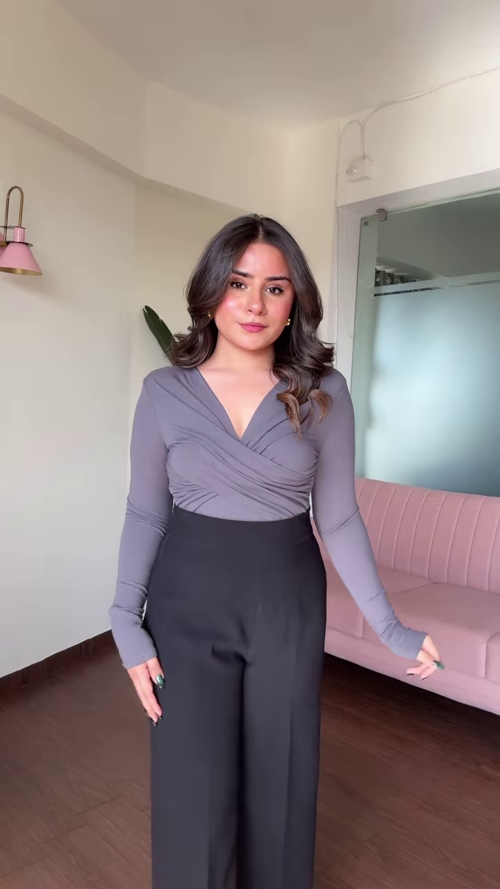 Chic Women's Outfit: Blue Mock Neck Long Sleeve Top and High-Waisted Black Wide-Leg Pants - Image 5