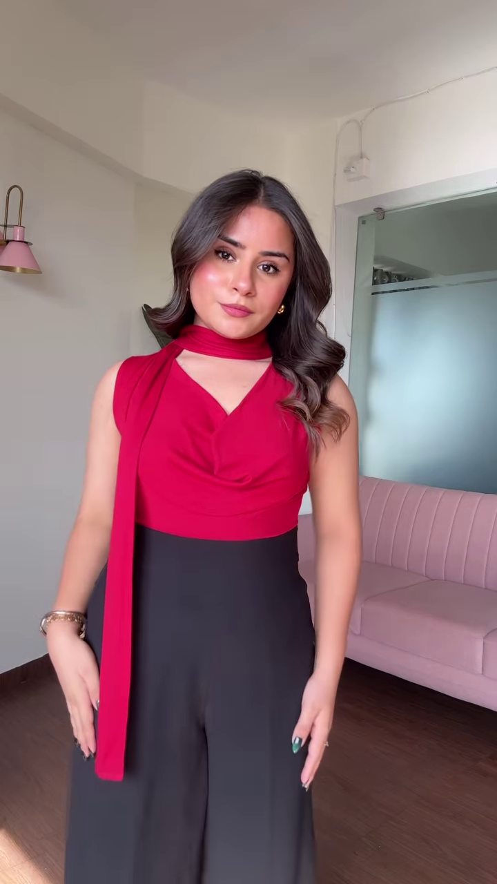 Chic Women's Outfit: Blue Mock Neck Long Sleeve Top and High-Waisted Black Wide-Leg Pants - Image 3