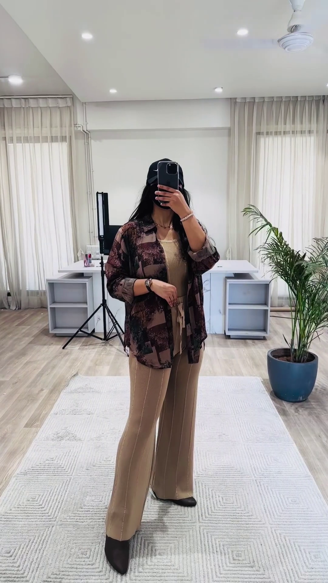 Bohemian Chic Outfit: Patterned Overshirt, Knit Top, and Wide-Leg Pants