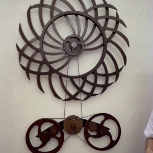 Intricate Kinetic Wall Sculpture with Moving Gears and Abstract Design