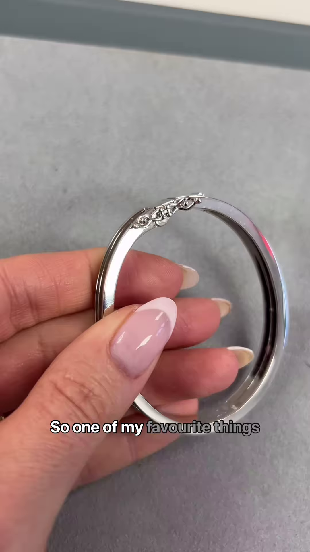 Elegant Silver-Toned Bangle Bracelet with Personalized Inscription and Sparkling Accents - Image 2