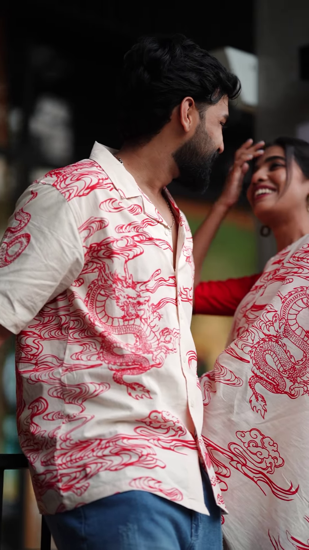 Couple’s Coordinated Ethnic Ensemble – White & Red Printed Saree with Matching Shirt and Jeans - Image 3