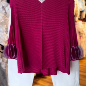 Women’s Textured Red Long-Sleeve Top with V-Neck Collar & Pleated Sleeve Detail – Paired with White Slim Pants